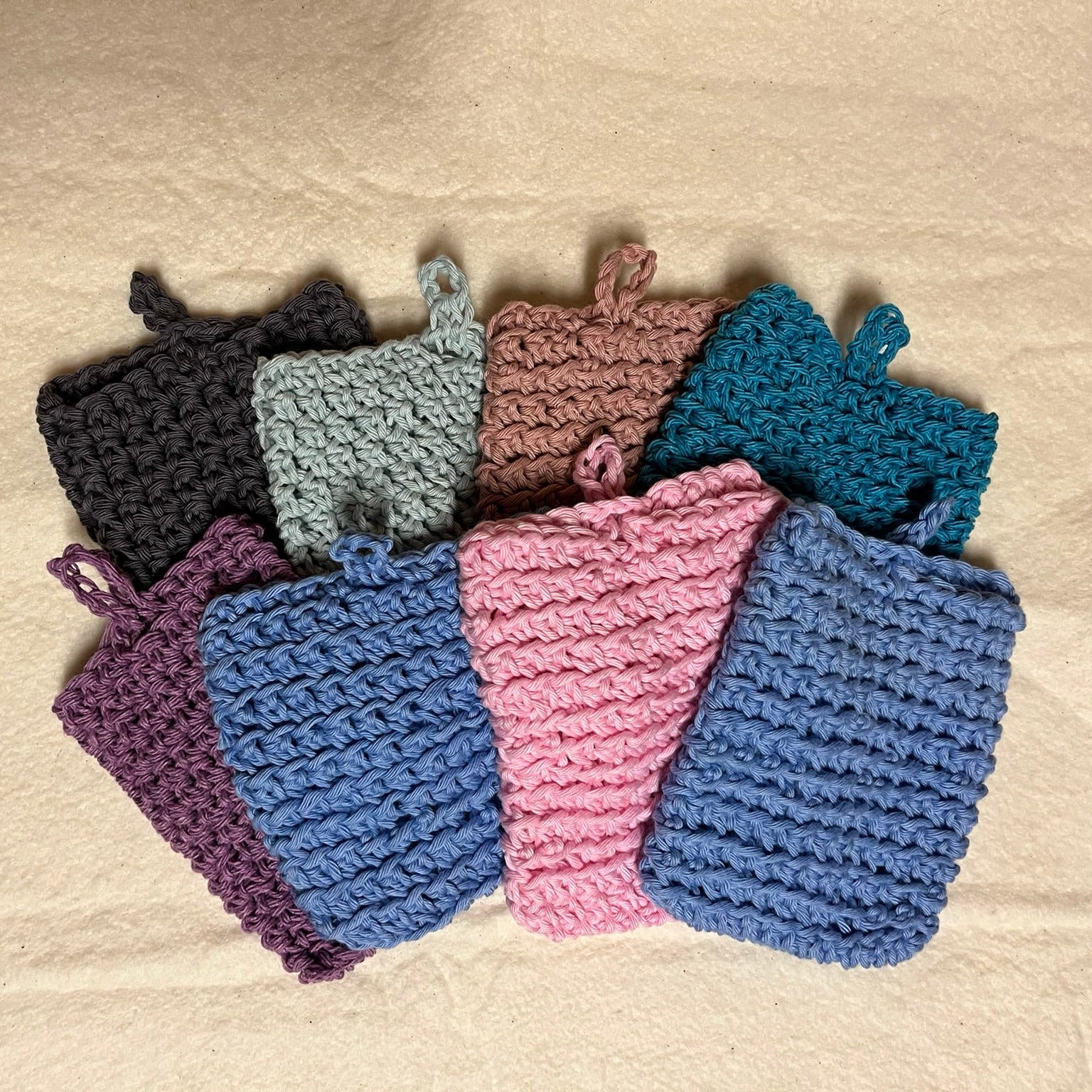 Stack of crochet soap pouches