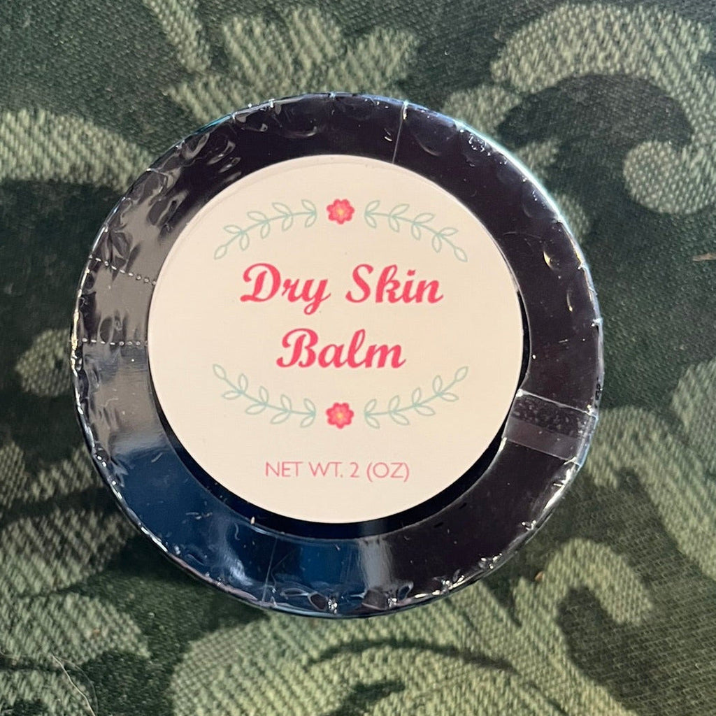 Dry Skin Balm container with label on a camouflage background