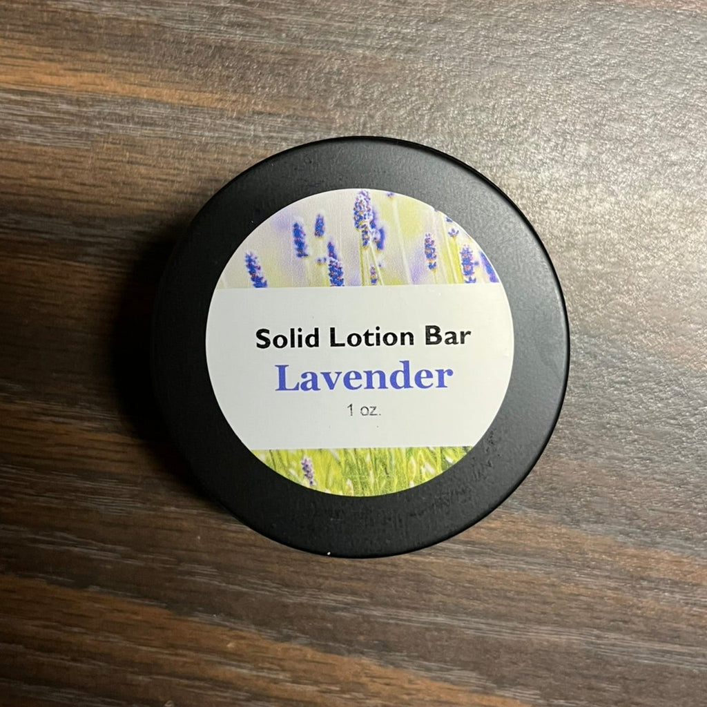 A tin containing lavender lotion bar