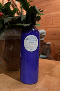Bottle of lotion on wood table